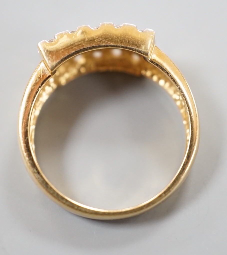 A modern 18ct gold and pave set diamond cluster ring, size K, gross weight 3.9 grams.